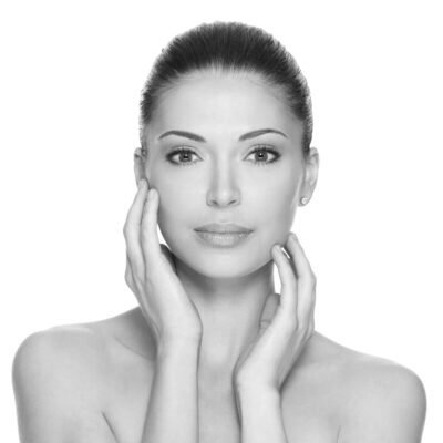 adult-woman-with-beautiful-face-isolated-white-skin-care-concept-400x400